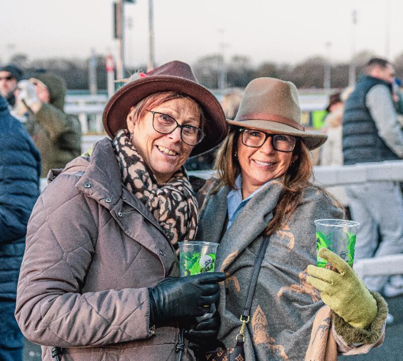 Two well-dressed women at Wolverhampton Racecourse
