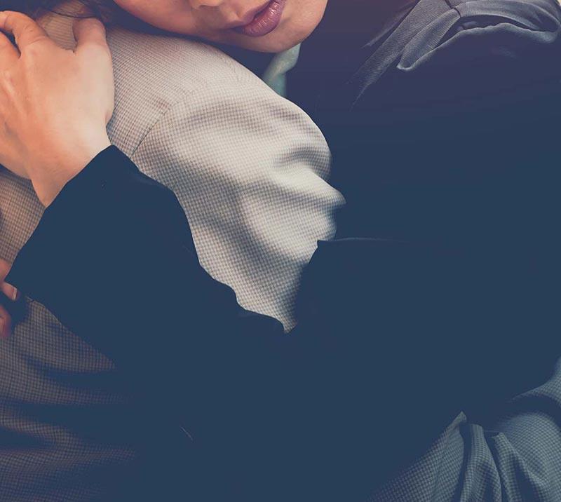 Someone provides a shoulder of sympathy to friend.