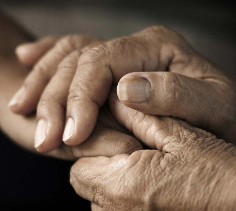 A couple of hands gently held together