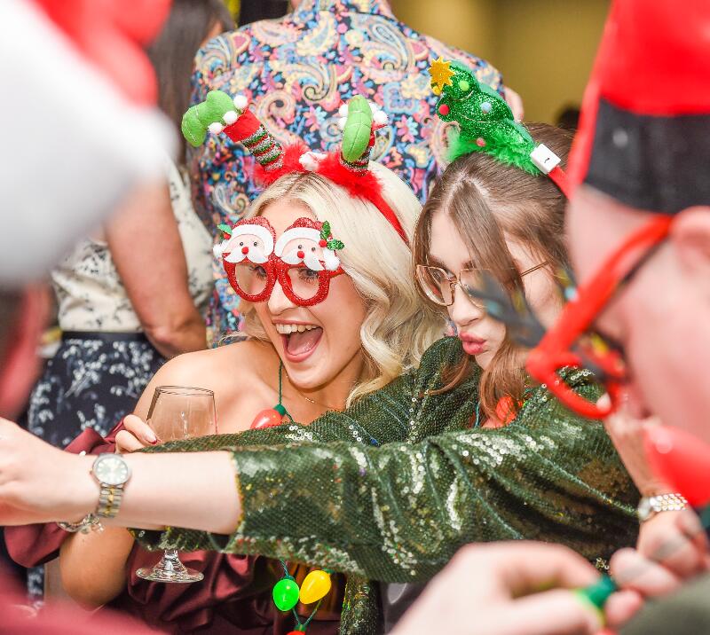 Two young women posing for a picture at a Christmas Party at Wolverhampton Racecourse