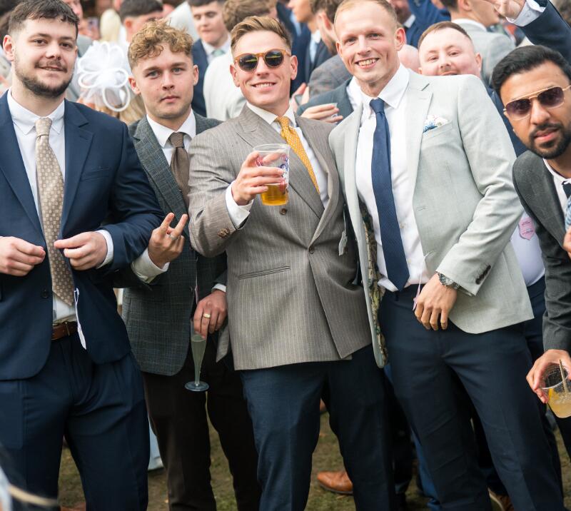 A group of 5 young men at Wolverhampton Racecourse for a Stag Do