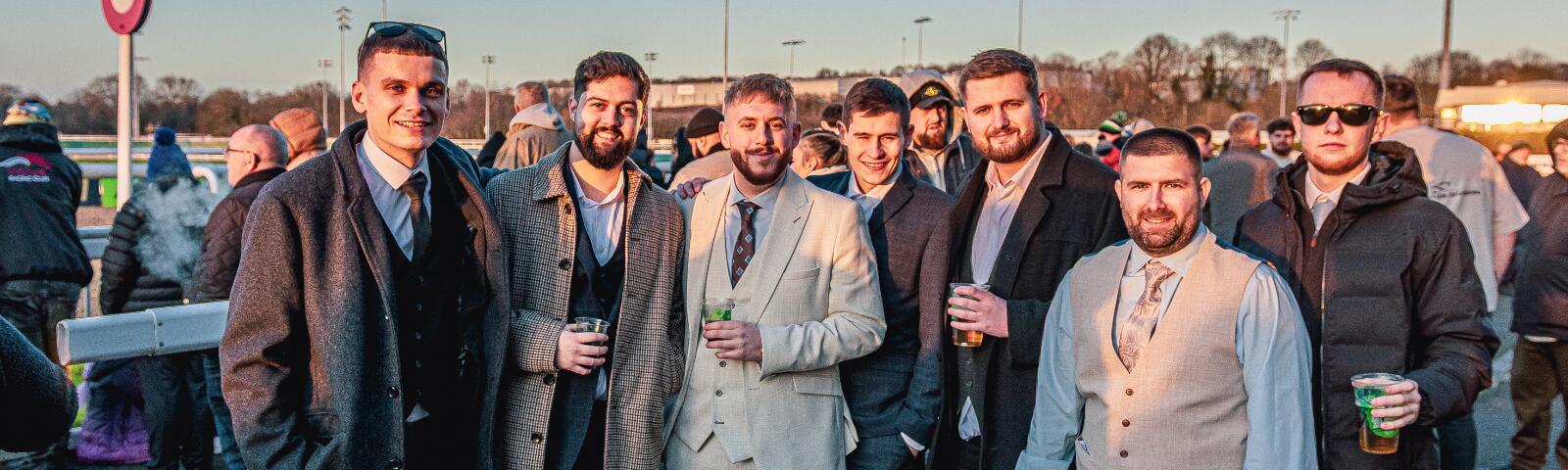 Group of 5 men dressed in suits at Wolverhampton Racecourse